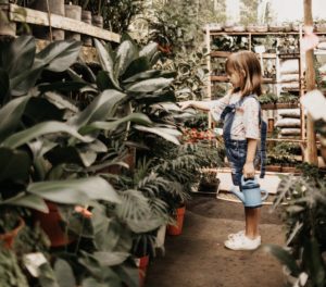 child gardening to take care of the Earth