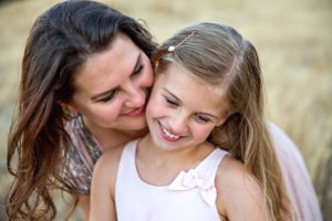 woman teaching daughter gratitude