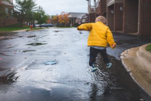 child on rainy day